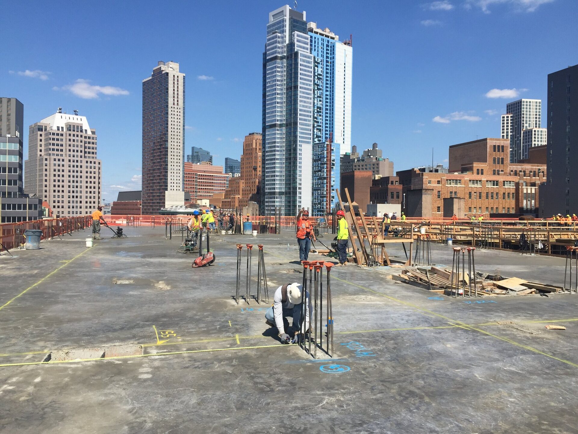 The Boerum — rooftop concrete pour with downtown Brooklyn skyline