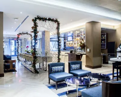 The Boerum — main lobby with seasonal staging and blue seating