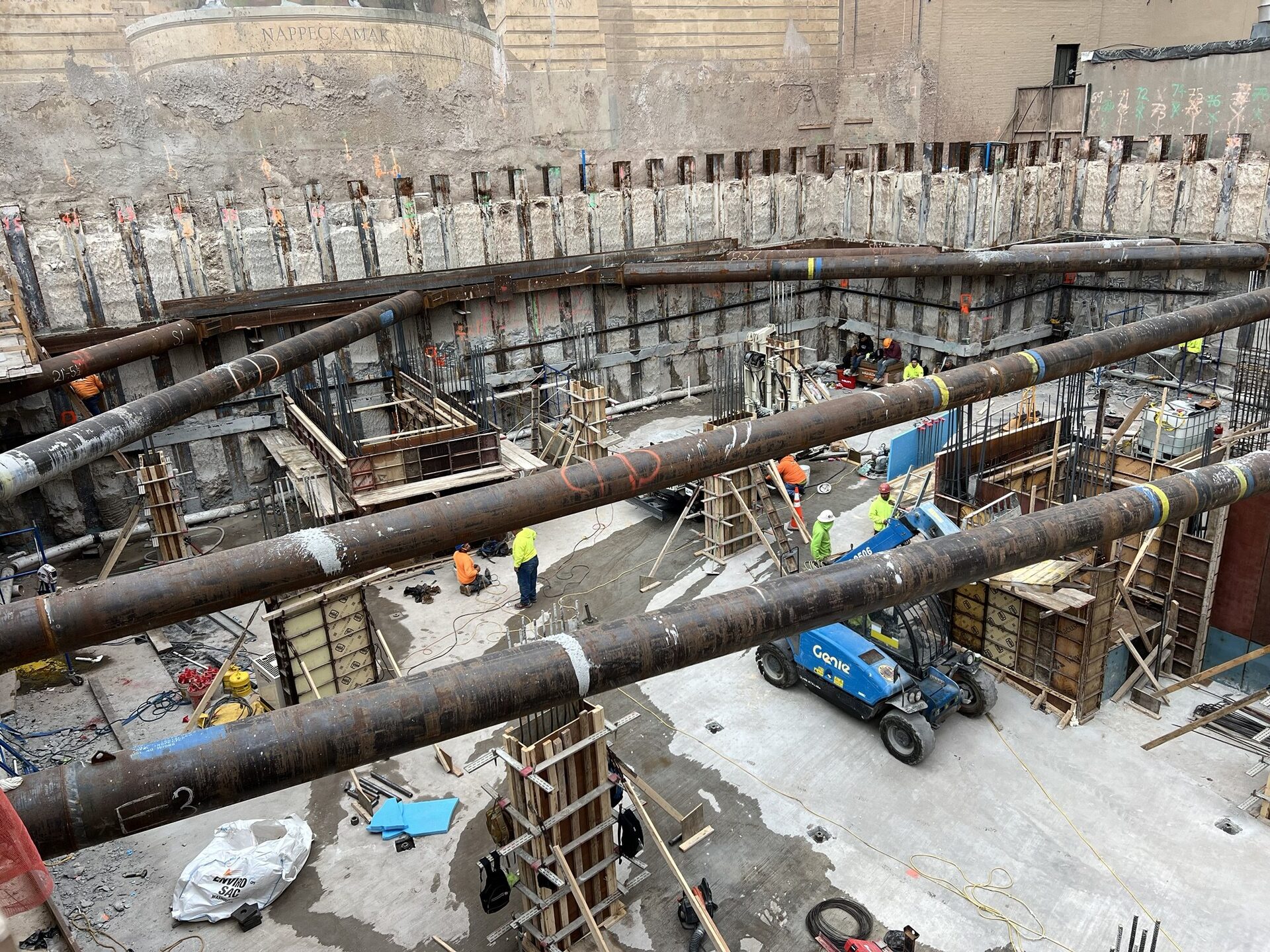 The St. Clair — Support of Excavation system holding back the dig, with soldier piles and horizontal struts